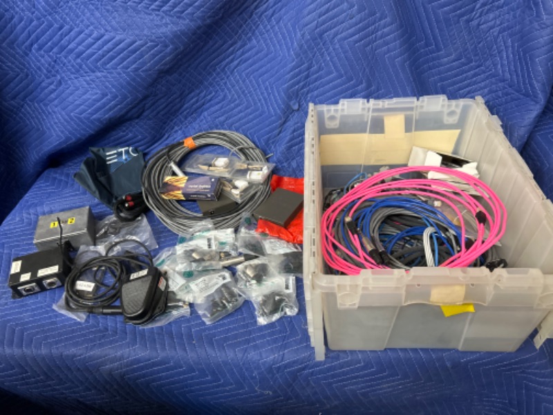 Photo 1 of Plastic tub full of cables and New in packages XLR parts and  clipper foot switch hot service igniters and more 