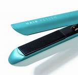 Photo 2 of CERAMIC STRAIGHTENER DESIGNED FOR ALL HAR TYPES HEATS UP QUICKLY HAS A TIP FOR YOUR FINGERS IF CURLING BOX HAS BEEN DAMAGED DUE TO SHIPMENT PRODUCT NEW  $48.99
