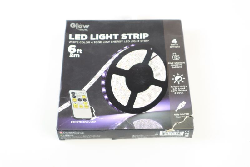Photo 1 of GABBAGOODS 6FT WHITE COLOR  LED LIGHT STRIP WITH REMOTE BOX IS TORN $9.99