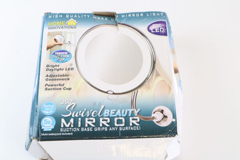 Photo 3 of BEAUTY SWIVEL MIRROR 10X MAGNIFICATION 7IN DIAMETER  360 DEGREE ROTATION BATTERY OPERATED LED BOX IS DAMAGED $19.99