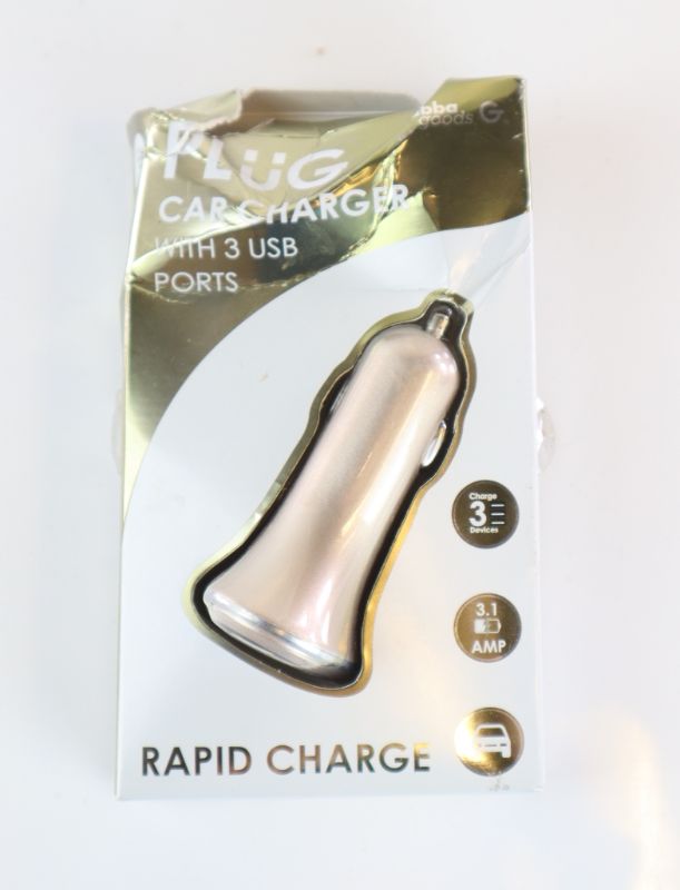 Photo 1 of GABBA GOODS RAPID CAR CHARGER 3 PORT  3.1 AMP COLOR CHAMPAGNE BOX HAS SLIGHT DAMAGE DUE TO SHIPMENT NEW AND REPACKAGED $16.99 