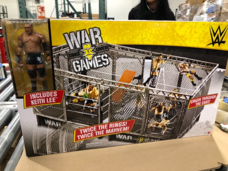 Photo 2 of ?WWE NXT Takeover War Games Playset with 2 NXT Rings, Keith Lee Action Figure, 2 Connecting Cages with Breakaway Pieces, 2 Ladders, Chair, Table & More; for Ages 6 Years Old & Up
