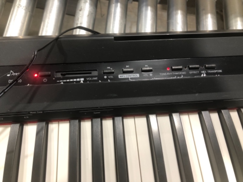 Photo 5 of Donner DEP-10 Beginner Digital Piano 88 Key Full Size Semi-Weighted Keyboard, Portable Electric Piano with Sustain Pedal, Power Supply
