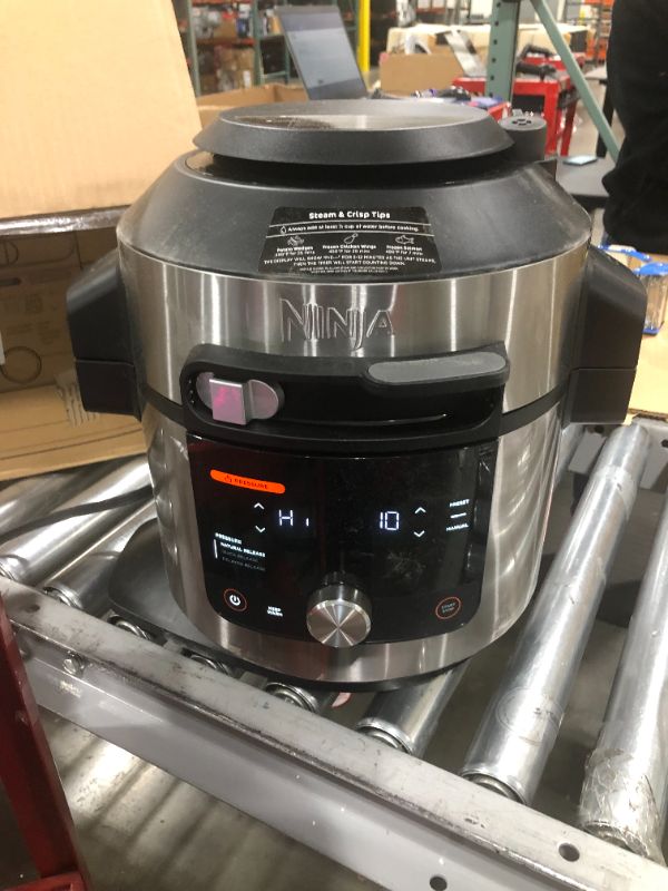 Photo 2 of Ninja OL701 Foodi SMART XL 8 Qt. Pressure Cooker Steam Fryer with SmartLid & Thermometer + Auto-Steam Release, 14-in-1 that Air Fries, Bakes & More, 3-Layer Capacity, 5 Qt. Crisp Basket, Silver/Black
