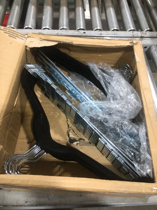 Photo 1 of 20 PIECE BLACK METAL HANGERS 