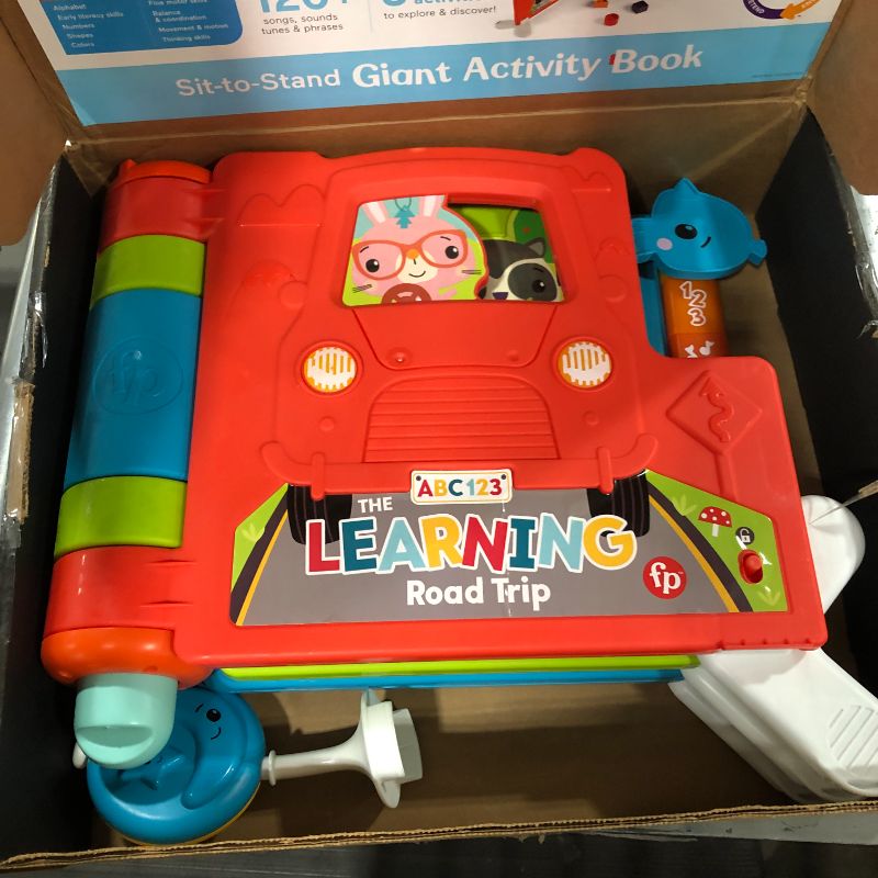 Photo 1 of Fisher-Price Sit-to-Stand Giant Activity Book, Electronic Learning Toy and Activity Center for Infants and Toddlers Ages 6 Months to 3 Years