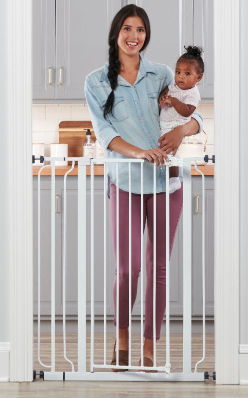 Photo 1 of Regalo Easy StepÂ® Extra Tall Walk Thru Baby Gate, Includes 4-Inch Extension Kit, 4 Pack of Pressure Mount Kit and 4 Pack Wall Cups and Mounting Kit
