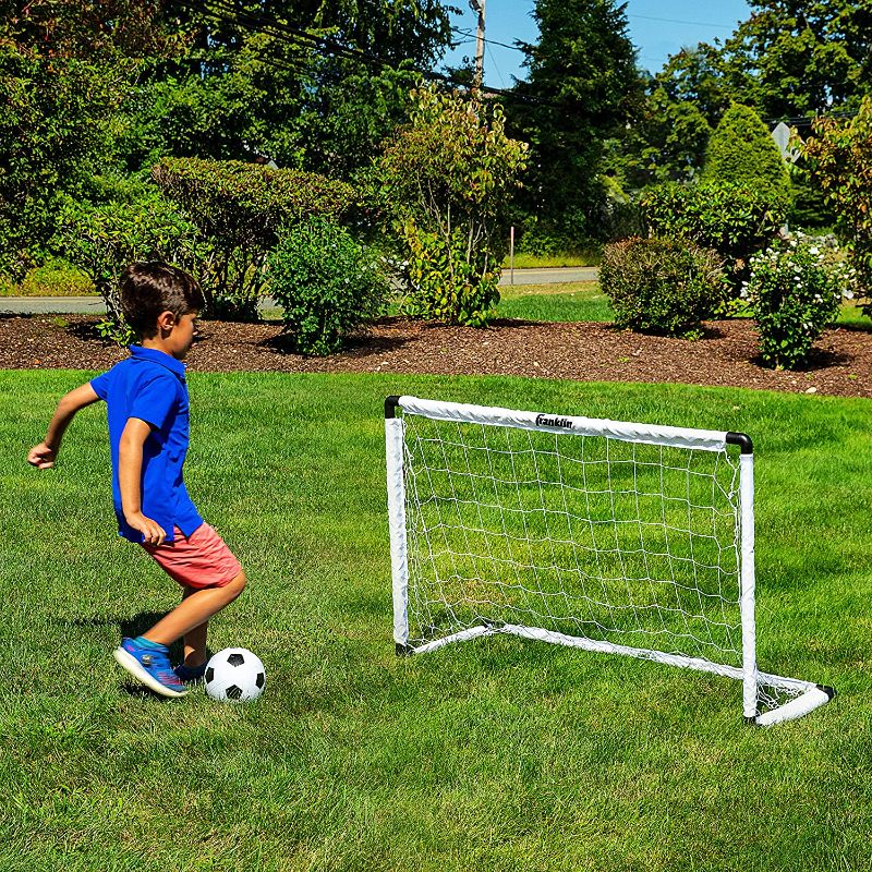 Photo 1 of Franklin Sports Kids Soccer Goal Set - Portable Backyard Youth Soccer Goals - 2 Mini Soccer Goals with Ground Stakes - 54" x 36"
