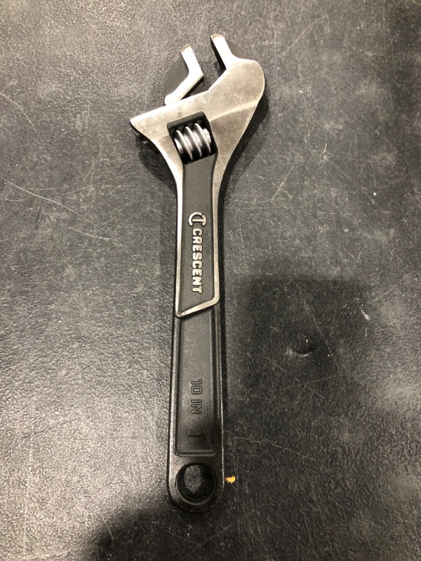 Photo 2 of CRESCENT Brand 10 Inch Adjustable Wrench, Black. NEW. MISSING PACKAGE.