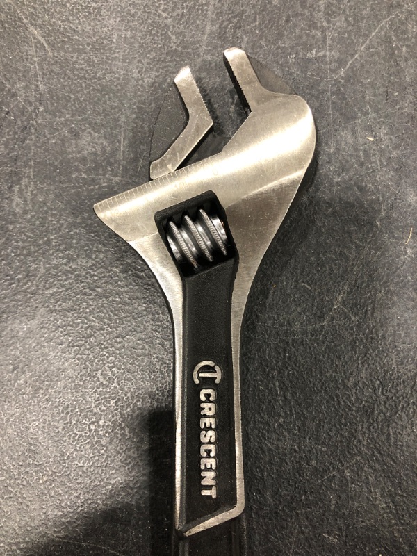 Photo 1 of CRESCENT Brand 10 Inch Adjustable Wrench, Black. NEW. MISSING PACKAGE.