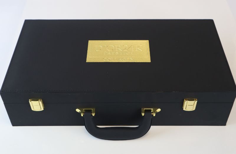 Photo 3 of MSRP $9950 : BLACK SUITCASE FILLED WITH THE COLLAGEN COLLECTION AND  COLLAGEN RENEWAL FACE MASK SET INCLUDES 12 COLLAGEN RENEWAL FACE MASKS ONE 24K COLLAGEN SERUM ONE 24K COLLAGEN MASK AND ONE 24K COLLAGEN CREAM NEW IN SUITCASE