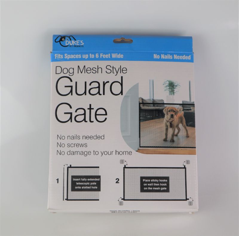 Photo 3 of MESH GUARD GATE BARRIER GOOD FOR CARS OR HOME NO SCREWS OR NAILS EASY SET UP NEW $24.99