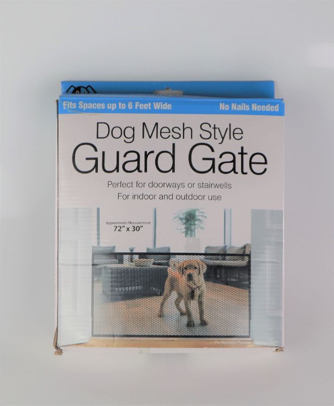 Photo 2 of MESH GUARD GATE BARRIER GOOD FOR CARS OR HOME NO SCREWS OR NAILS EASY SET UP NEW $24.99