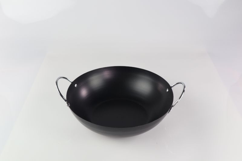 Photo 1 of BLACK STEEL WOK $34.99