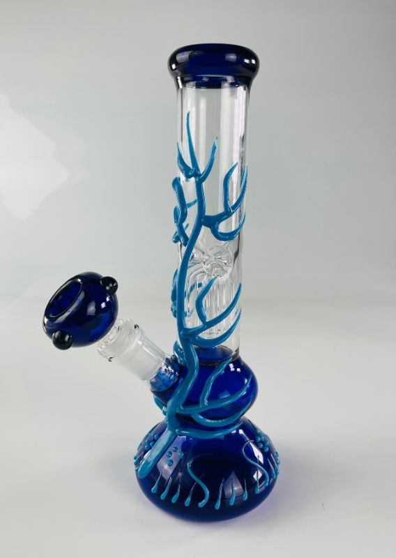Photo 2 of FREEDOM HANDMADE WATER PIPE BLUE BASE WITH LIGHT BLUE GLOW IN THE DARK VINES INCLUDING PERCOLATORS ICE CATCHER BOWL AND STEM NEW IN BOX.
$75
