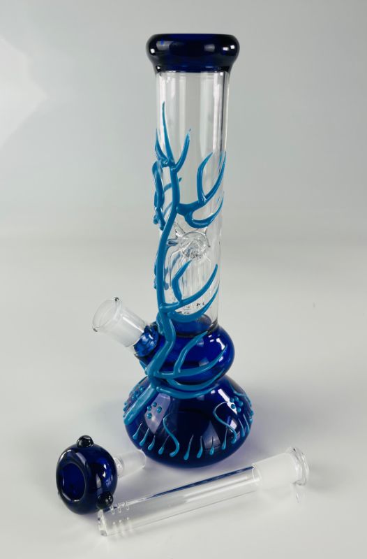 Photo 1 of FREEDOM HANDMADE WATER PIPE BLUE BASE WITH LIGHT BLUE GLOW IN THE DARK VINES INCLUDING PERCOLATORS ICE CATCHER BOWL AND STEM NEW IN BOX
$75