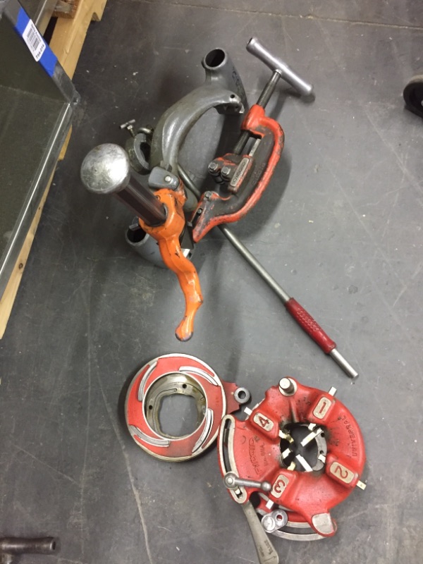 Photo 7 of  Ridgid Automatic Threading Machine Model 535A with 1/2" - 2" NPT Die Heads heavily used, scuffs scrapes and dents  
item is not working in current condition 