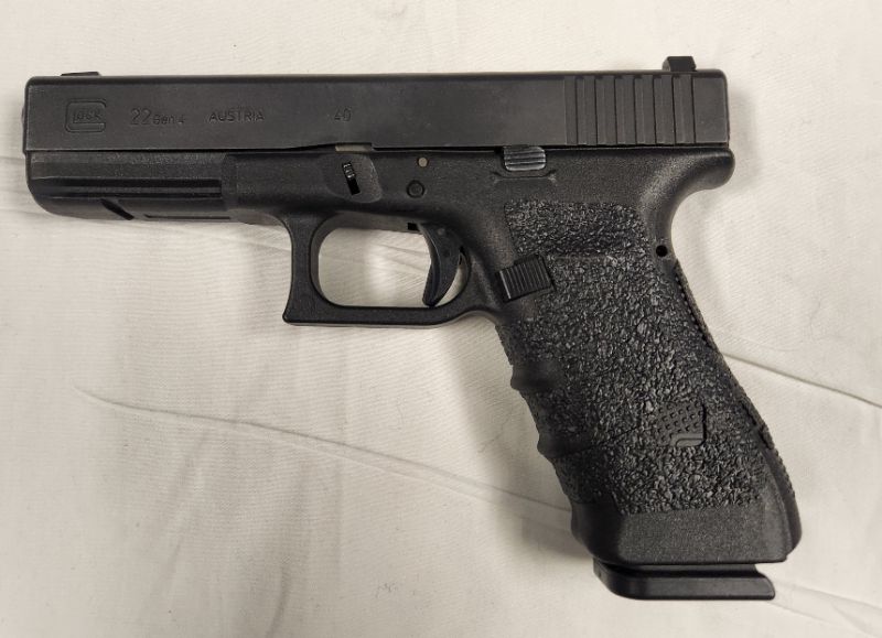 Photo 2 of Glock 22 Gen 4 .40 Caliber Pistol w/ 6 Magazines. Background Check Required. Every used firearm should be inspected by a qualified gunsmith before firing. 