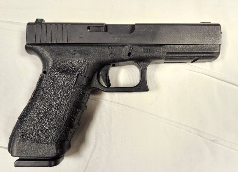 Photo 3 of Glock 22 Gen 4 .40 Caliber Pistol w/ 6 Magazines. Background Check Required. Every used firearm should be inspected by a qualified gunsmith before firing. 