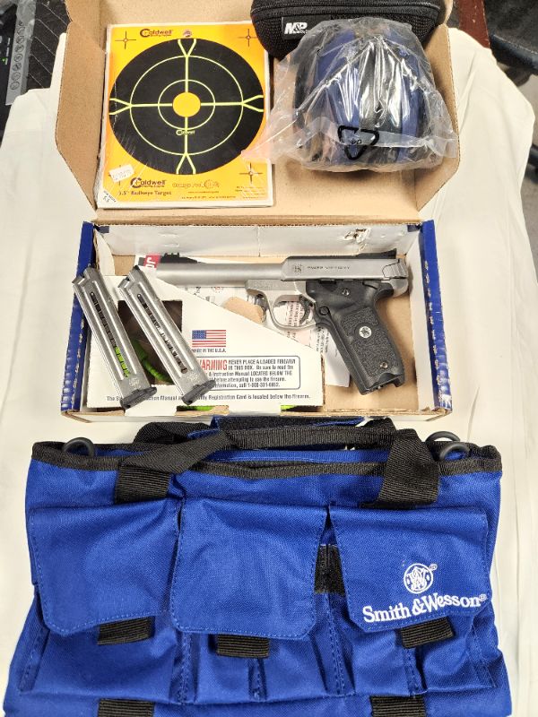 Photo 1 of Smith & Wesson SW22 Victory .22LR Pistol Range Kit. Background Check Required. Every used firearm should be inspected by a qualified gunsmith before firing.