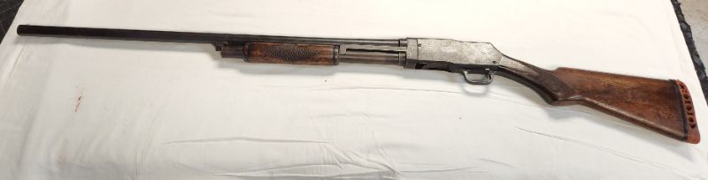 Photo 6 of Wards Westernfield Model 35 12 GA Pump Shotgun - Needs a Good Cleaning. Background Check Required. Every used firearm should be inspected by a qualified gunsmith before firing.