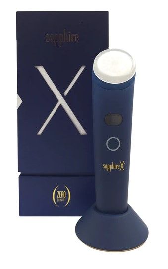 Photo 1 of SAPPHIRE X DEVICE TREAT AND HEAL FIRST LAYER OF SKIN EPIDERMIS DUAL ACTION TECHNOLOGY BLUE LIGHT AND TOPICAL HEATING CARE WATER RESISTANT DISINFECTS DETOXIFIES AND ELIMINATES BACTERIA INCREASES BLOOD FLOW PROVIDES NUTRIENTS AND OXYGEN TO NATURALLY IMPROVE
