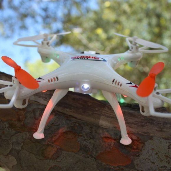 Photo 1 of WHITE KINGCO 6INCH K35 MINI DRONE WITH WIFI CAMERA LED LIGHTS ARE WHITE AND GREEN BATTERY 3.7V RECHARGEABLE NEW $175