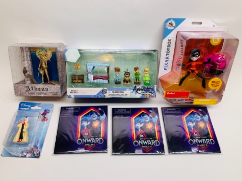 Photo 1 of Disney toys in packages 