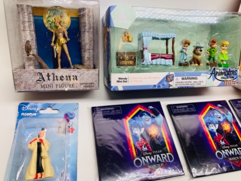 Photo 3 of Disney toys in packages 