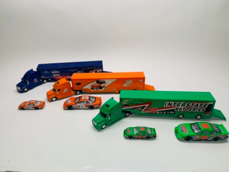 Photo 3 of 3 large die cast trucks with trailers and 4 die cast cars