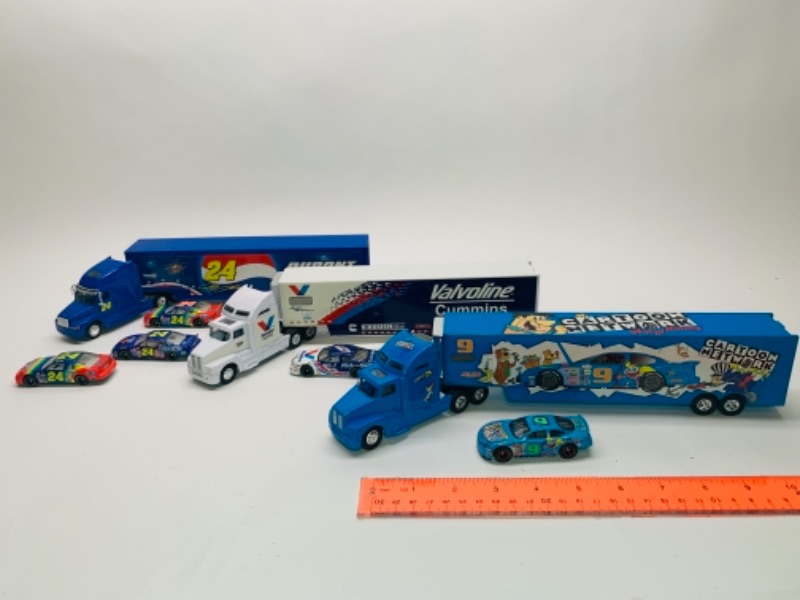 Photo 1 of 3 die cast trucks with trailers and 5 die cast cars 