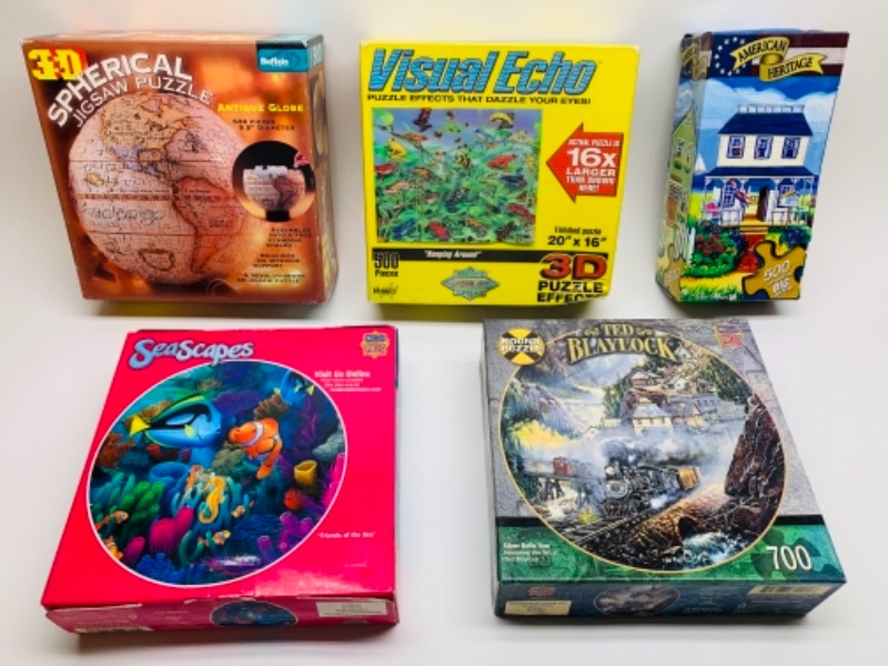 Photo 1 of 5 puzzles in original boxes- some 3-d