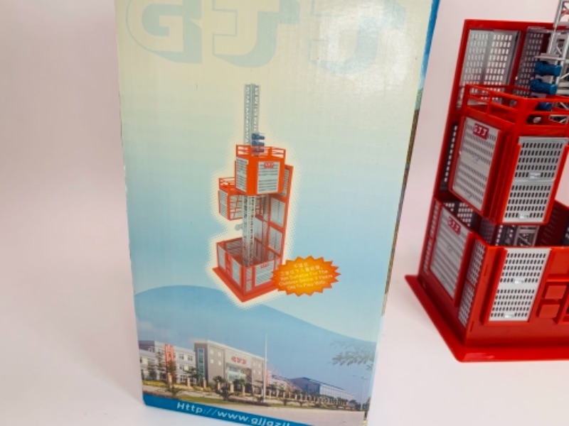 Photo 1 of Gjj sc type building hoist toy in original box 