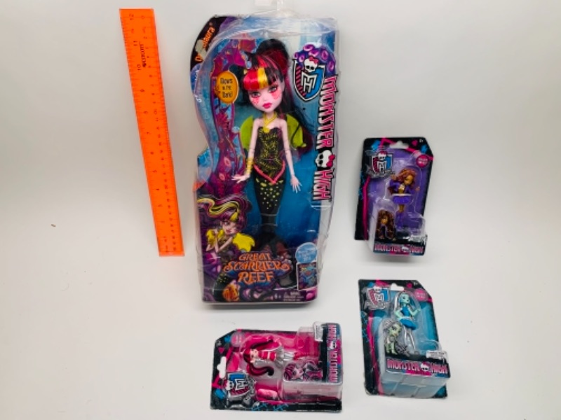 Photo 1 of Monster high dolls in packages- large package has dents