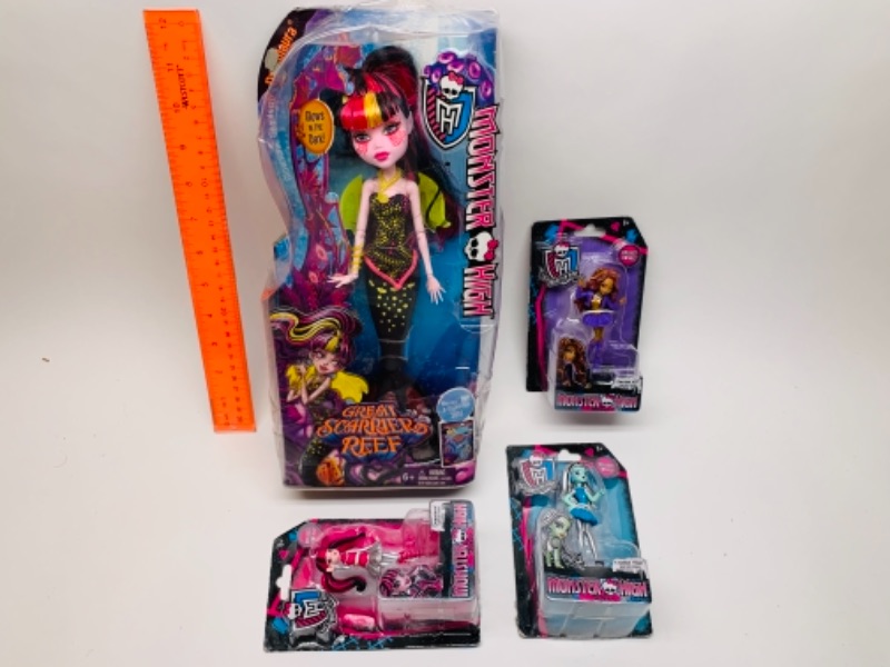 Photo 4 of Monster high dolls in packages- large package has dents