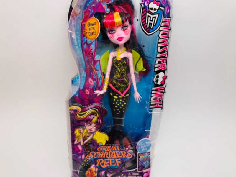 Photo 2 of Monster high dolls in packages- large package has dents