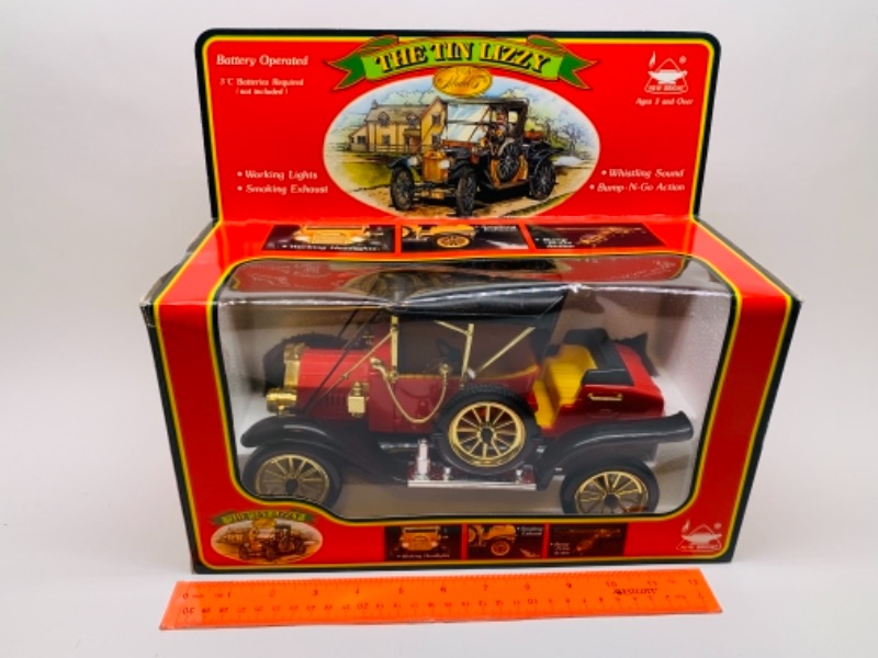 Photo 1 of The tin lizzy battery operated car in original box 