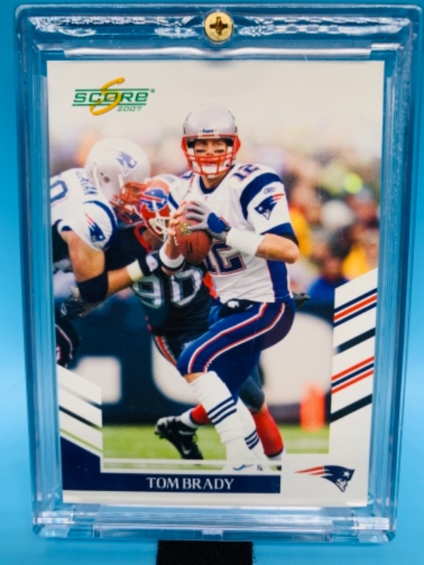 Photo 1 of 2007 donruss Tom Brady card 155 in hard plastic case 