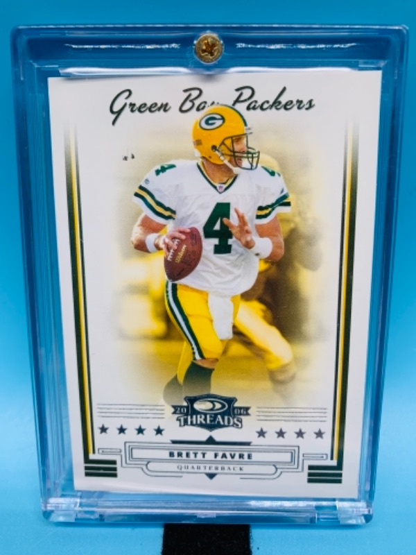 Photo 1 of 2006 donruss Brett Favre card 43 in hard plastic case