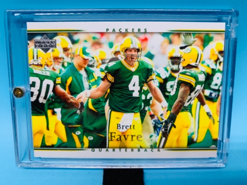 Photo 1 of 766108…2007 upper deck Brett Favre card 68 in hard plastic case