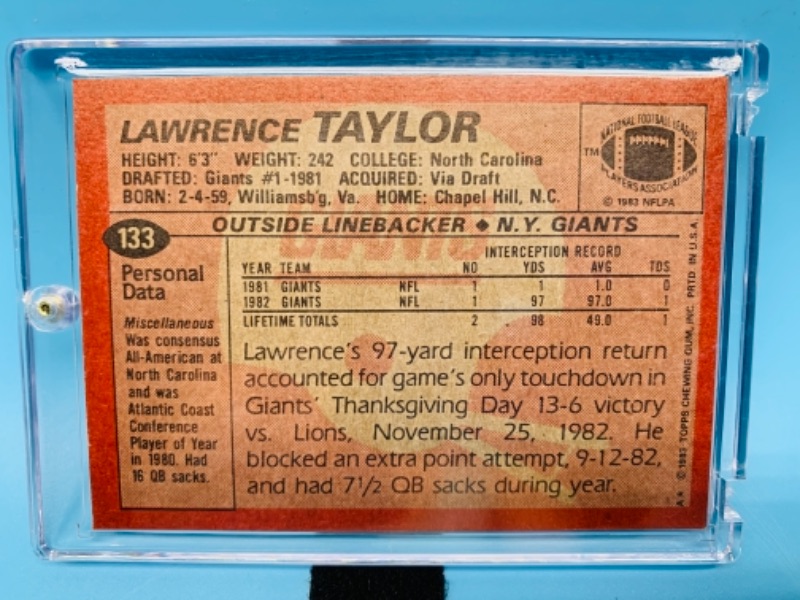 Photo 2 of 1983 topps Lawrence Taylor card 133 in hard plastic case