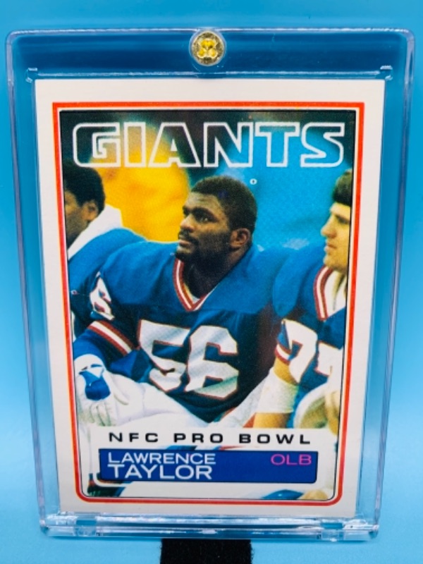 Photo 1 of 1983 topps Lawrence Taylor card 133 in hard plastic case