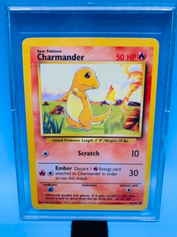 Photo 1 of Pokémon charmander 46/102 scratch basic card in hard plastic case 