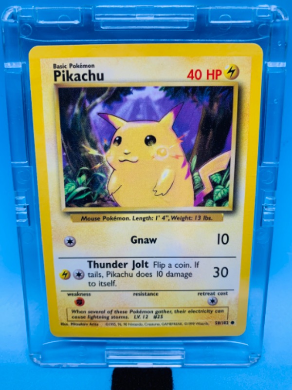 Photo 1 of 766122…Pokémon pikachu 58/102 gnaw basic card in hard plastic case 