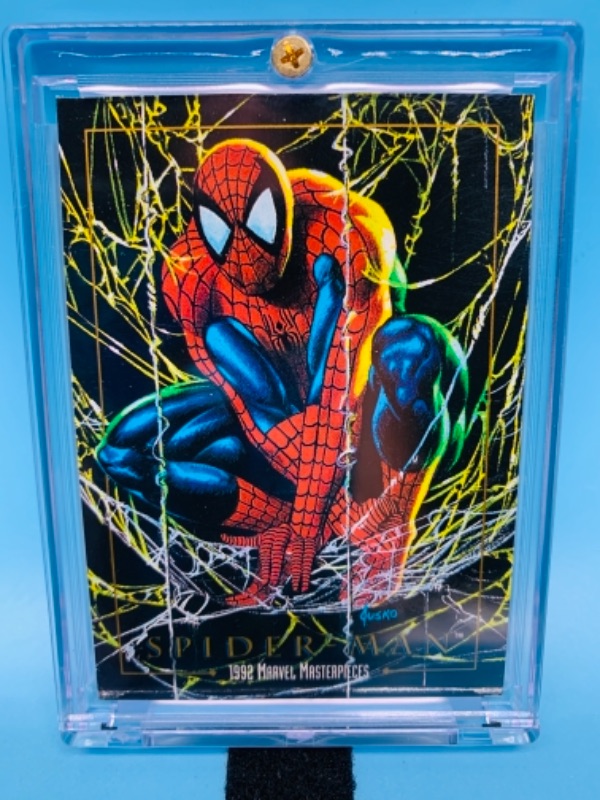 Photo 1 of 1992 Marvel masterpieces Spiderman card 87 in hard plastic case