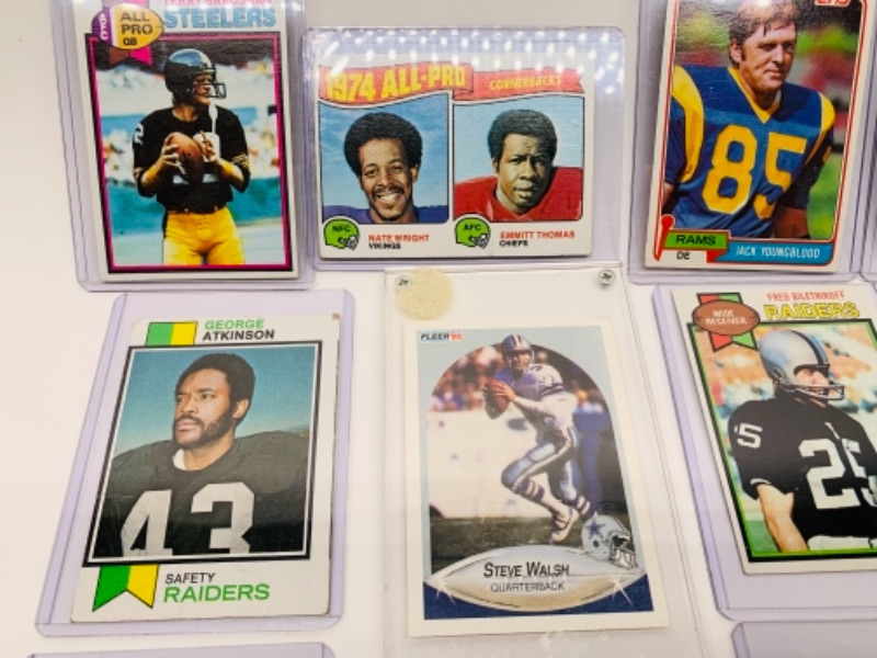 Photo 3 of 12 older sports cards in hard plastic sleeves 