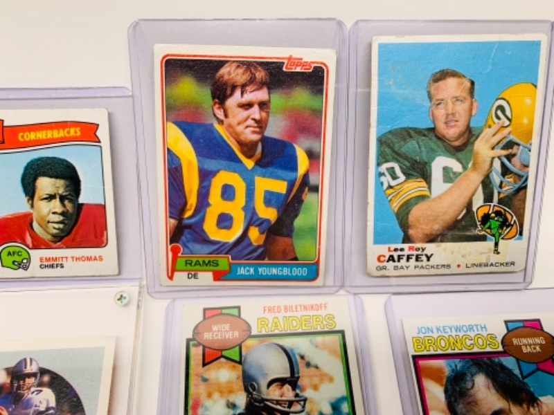 Photo 6 of 12 older sports cards in hard plastic sleeves 