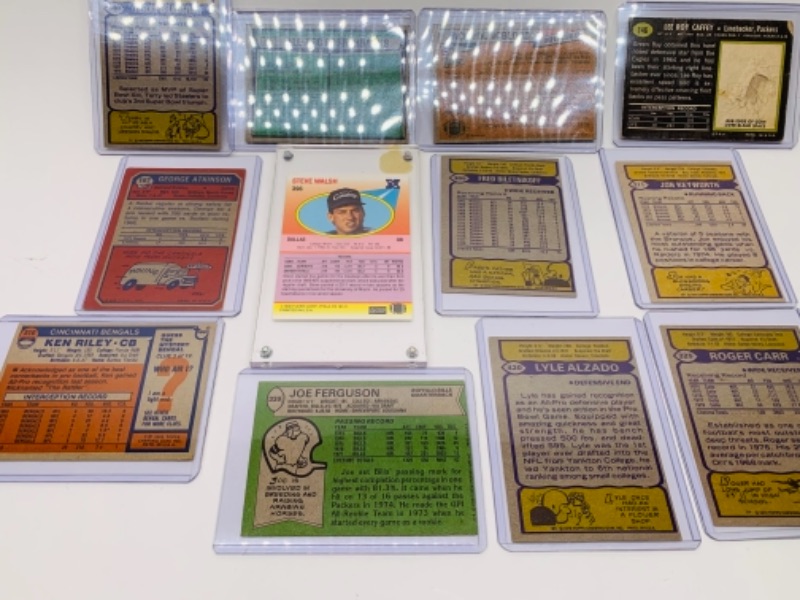 Photo 5 of 12 older sports cards in hard plastic sleeves 