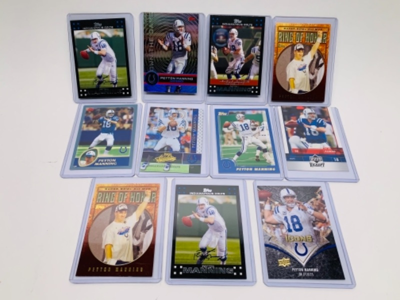 Photo 1 of 11 Peyton Manning trading cards in  hard plastic sleeves