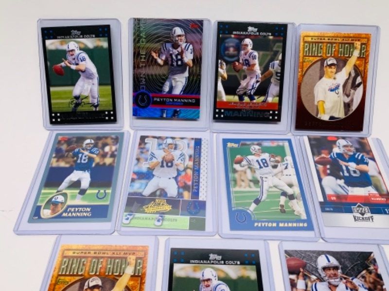 Photo 1 of 11 Peyton Manning trading cards in  hard plastic sleeves